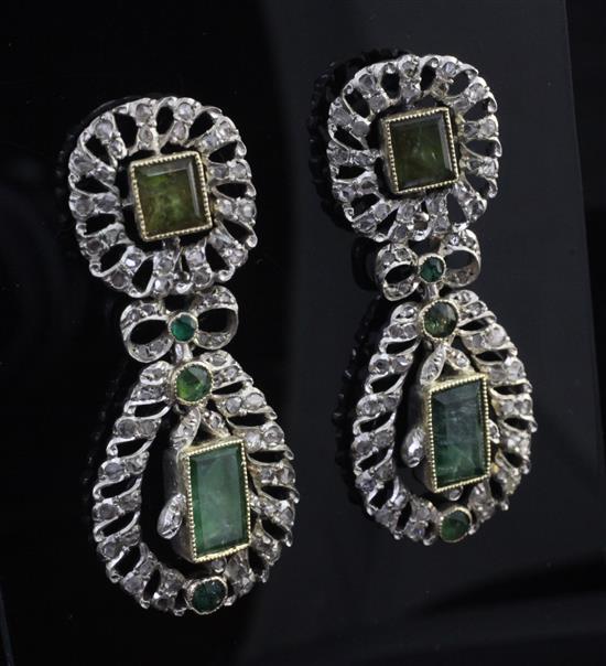 A pair of mid 20th century Indian? silver and gold, emerald and diamond drop earrings, overall approx. 1.75in.